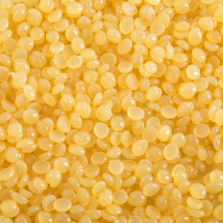 Honey Yellow synthetic film wax beads close-up